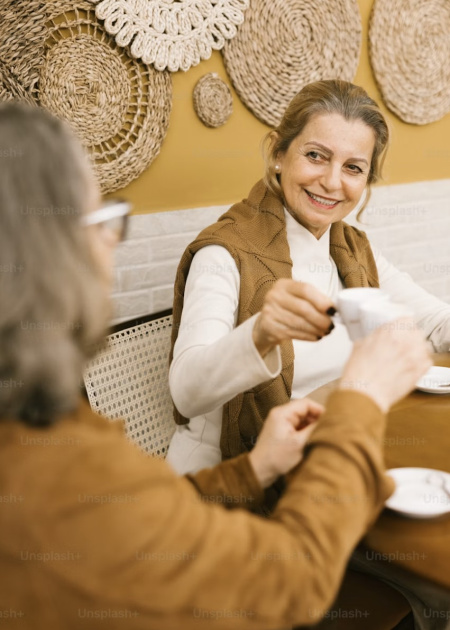 Ladies having coffee #buildacapsulewardrobe https://www.style-yourself-confident.com/build-a-capsule-wardrobe.html